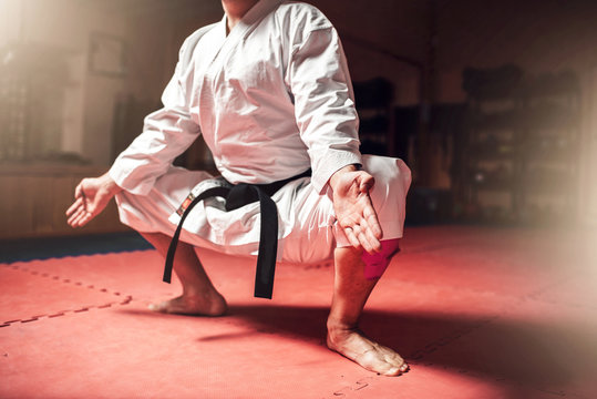 Martial arts master meditation training in gym