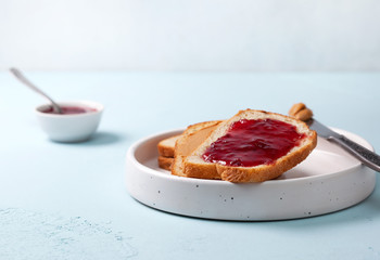 Toast with peanut butter and jam © natashamam35
