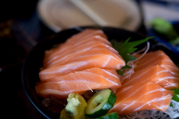 Close up slice of salmon sashimi