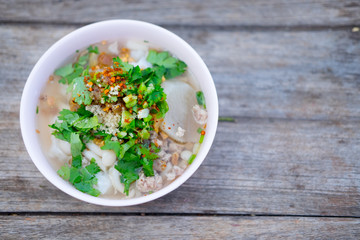 Rice boiled with pork garlic and coriander bowl