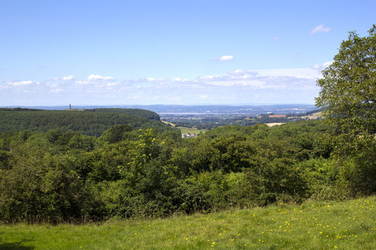 View towards the Tynedale Monument on the edge of the Cotswold Hills escarpment near Wotton Under Edge, Gloucesteshire, UK.
