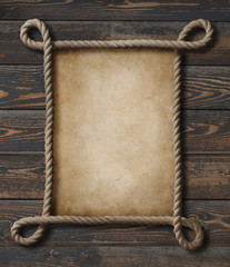 Pirate theme nautical rope frame with old paper background