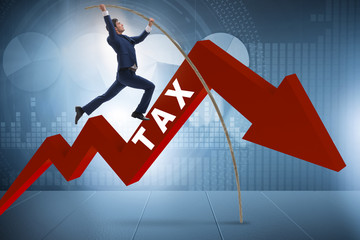 Businessman jumping over tax in tax evasion avoidance concept