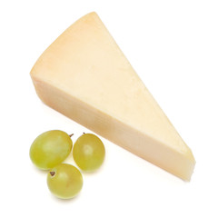 Piece of parmesan cheese on white background