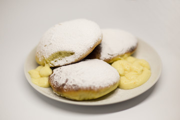 Baked bomboloni with pastry cream