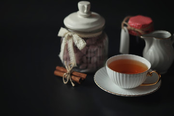 Set for breakfast. Sweets and pastries with nuts for tea on a bl