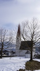 Fototapeta na wymiar Heilige Jungfrau und Märtyrerin Juliana, Terfens near Schwaz, Tyrol, Austria - church in winter 2018 with snow