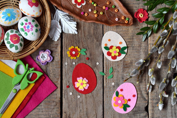 Making of handmade easter eggs from felt with your own hands. Children's DIY concept. Making Easter decoration or greeting card. Step 2. Decorate the egg.