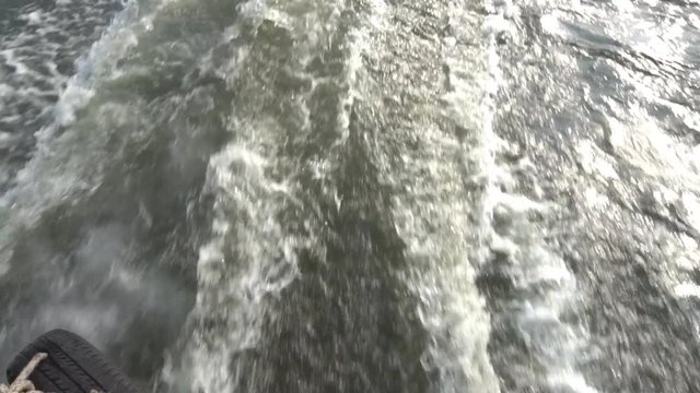 Water wave from boat, slow motion