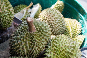 Naklejka na ściany i meble Durians in the market, famous fruit in Thailand