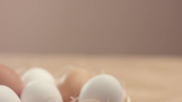 different eggs in basket. Small farm eco eggs