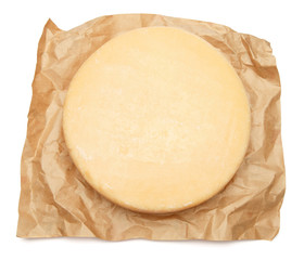 Whole round Head of parmesan or parmigiano hard cheese on white background