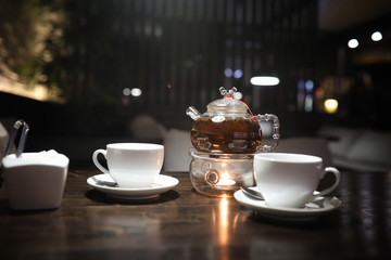 A table in a cafe with objects