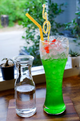Italian Soda, kiwi soda with ice.