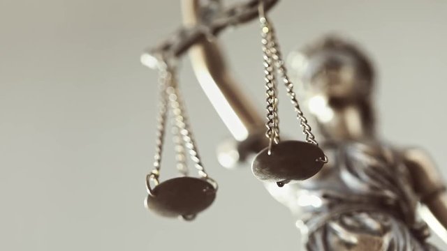 Justice lady holding scales