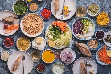 Cereals grains ingredients bulgur couscous in glass jars storaje concept