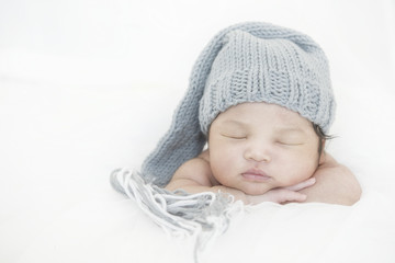 Close-up portrait of a beautiful sleeping baby newborn , 1 week old.