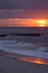 Golden Sunrise Over Crashing Waves. 