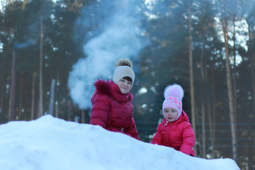 two sisters girls  winter for a walk