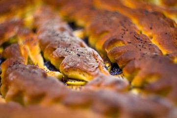 Fototapeta premium baked homemade rustic pie with apples, poppy seeds and jam