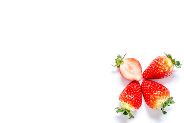 Strawberry with leaves close-up macro isolated on white background