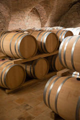 Wine barrels for storage in traditional cellar