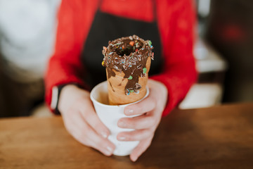 Baked trdelnik. Delicious bakery pastry food. Film look toned filter