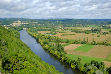 Late summer view over patchwork fields and river of the Dordogne valley near Castelnaud-la-Chapelle, Aquitane, France