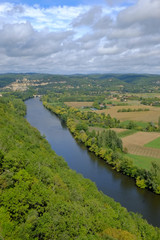 Fototapeta na wymiar Late summer view over patchwork fields and river of the Dordogne valley near Castelnaud-la-Chapelle, Aquitane, France