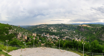 Fototapeta na wymiar Panoramic View of the mountainous city of Chiatura, famous for its manganese mines located on the river Kvirila, Georgia