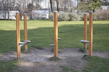 Fototapeta premium Milan, Italy - February 09, 2017 : Excercise tools in the park