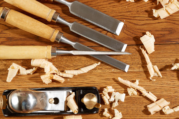 .DIY concept. Woodworking and crafts tools. Carpentry hand tools on a workbench. Planers, chisels,...