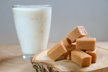 Fudges bars on wooden background.