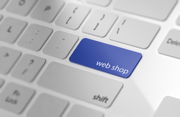 Blue WEB SHOP button on keyboard. Soft focus.