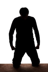 Portrait of a young man on the knees, front view