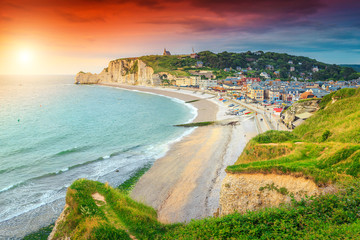 Beautiful sunrise with colorful clouds, Etretat, Normandy, France, Europe