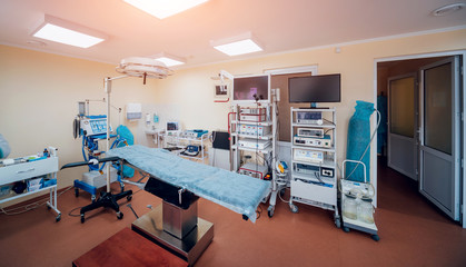Surgical equipment and medical devices in operating room.