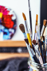 Artistic equipment.  Brushes and paints for drawing. Items for children's creativity.