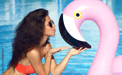 Young Sexy Pretty Woman In Swimming Pool Kissing Giant Inflatable Giant  Pink Flamingo Float Air Wall Mural | A-Dmitry Lobanov