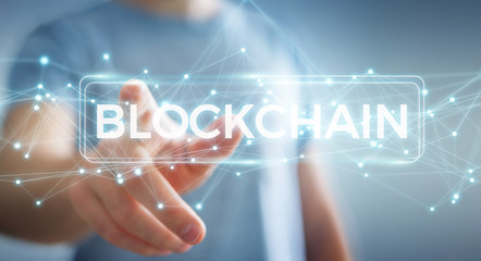 Businessman using blockchain cryptocurrency interface 3D rendering