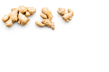 Fresh ginger root on white background top view copy space