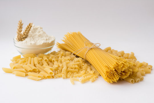 Multicolored pasta on a light background.
