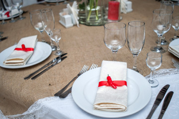 table serving with carnations and anemone flowers, table, fork, knife, plate, set, setting, background, decoration