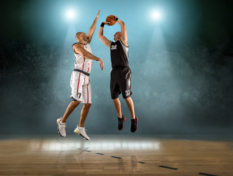 Caucassian Basketball Player in dynamic action with ball in a pr