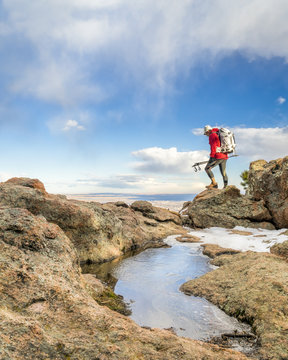 backpacker on a mountain ridge in Colorado