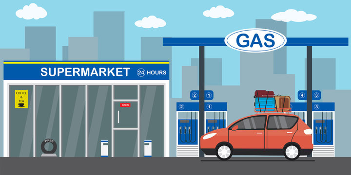 Gasoline fuel station,red car with luggage on the roof