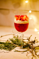 strawberry dessert with cream in a glass