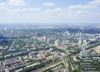 Fototapeta na wymiar Top view of big city in the summer.