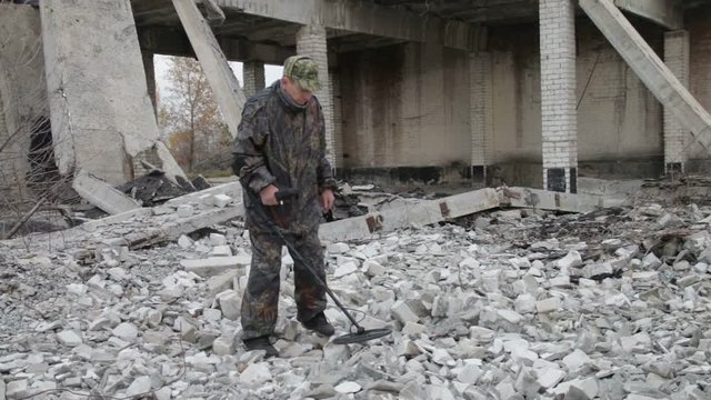 Man with a Metal Detector