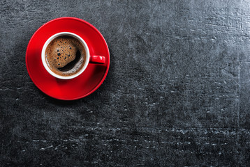 Stone table with coffee cup. Top view